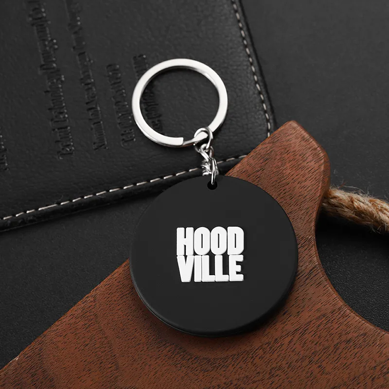 2453-6-Black circular custom logo PVC keychain