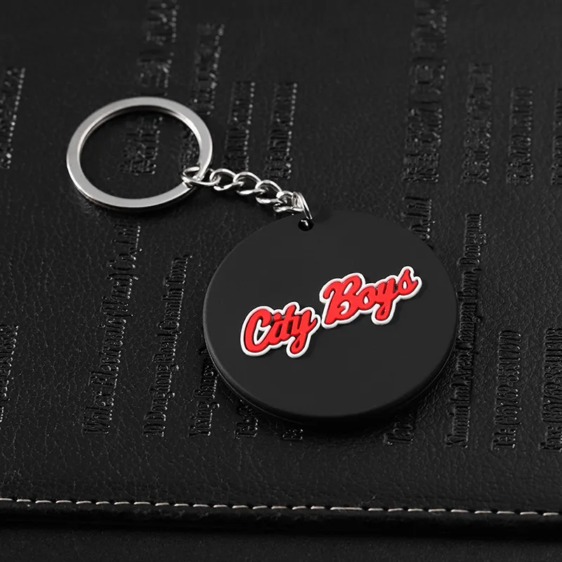2453-7-Black circular custom logo PVC keychain