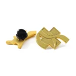 1922-2-A golden pin in the shape of an airplane