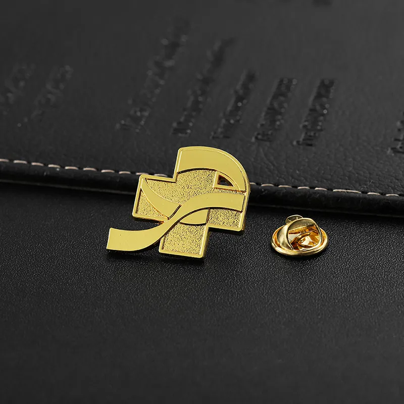 1922-6-A golden pin in the shape of an airplane